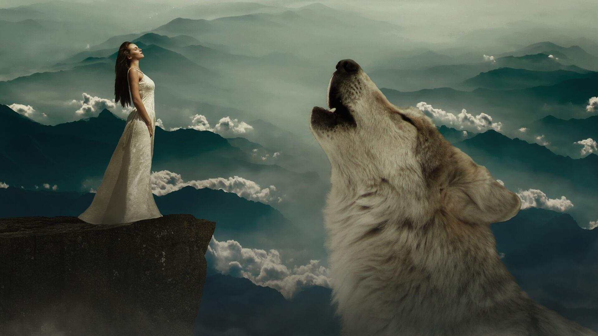 woman in white standing on the edge of a cliff opposite a howling wolf surrounded by hot air balloons